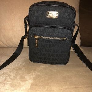 Black monogram Michael Kors crossbody.New with tag